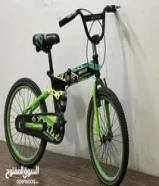 دينارCycle kids for 7kd green color with suspension and foldable (inner tubes needs to be changed)