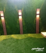 تنسيق حدائق وتركيب الثيل الصناعى والسور التركى وزرع