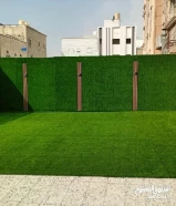 عروض لفتره محدوده اضاءه وديكورات بديل الخشب مع العشب الوردي والثيل الصناعي ارخص الاسعار