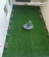 تنسيق حدائق وتركيب الثيل الصناعى