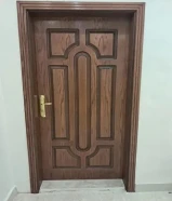 Carpenter making doors