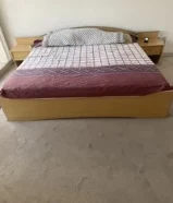 Double bed king size with attached side tables and mattress