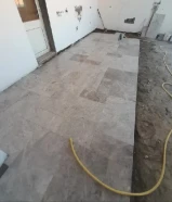 معلم تركيب وتكسير سراميك رخام جرانيت باركيه وتركيب المطابخ والحمامات تمديد الصحي وصيانتها