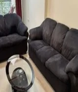 pieces of sofas ( one sofa 3 seat + one sofa 2 seat + 1 big chair ) brown color in good condition