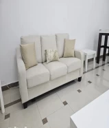 3 seated couch with tables