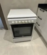 طباخ كهربائي مع فرن 4 عيون