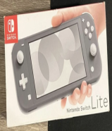 للبيع Nintendo Switch Lite رمادي و العاب متنوعة