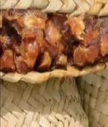 تمر الاحساء مغلف بالطريقة الحساوية التقليدية (القلة)