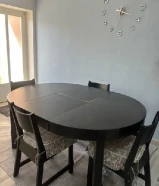 Oval extendable dining table with 4 chairs