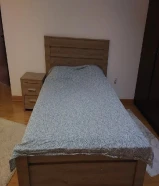 Good condition wooden King Size Bed + Mattress + Bedside Table