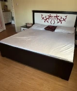 Calculate Your LoanQueen Sized bed with storage under space and + 2 Side Table (selling urgently) for just 30 kd