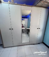 White cupboard with mirrors