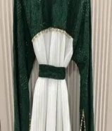 فستان مناسبات طويل مقاس 40 لل 46 مستعمل خفيف اللون اخضر وابيض مبطن من الداخل السعر 15 دينار