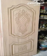 نجار أبواب وشراشيب وصيانه كل أنواع النجاره وعمل ديكورات ويجار وتركيب قواطع جبسامبورد وباركيه