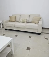 3 seated couch with tables